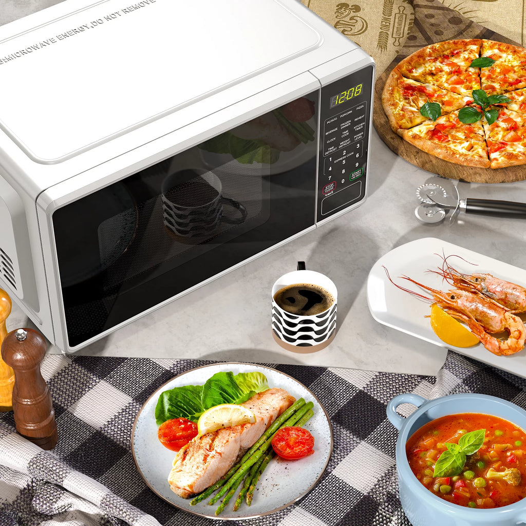 Mainstays 0.7 Cu Ft Countertop Microwave Oven, 700W, White D202