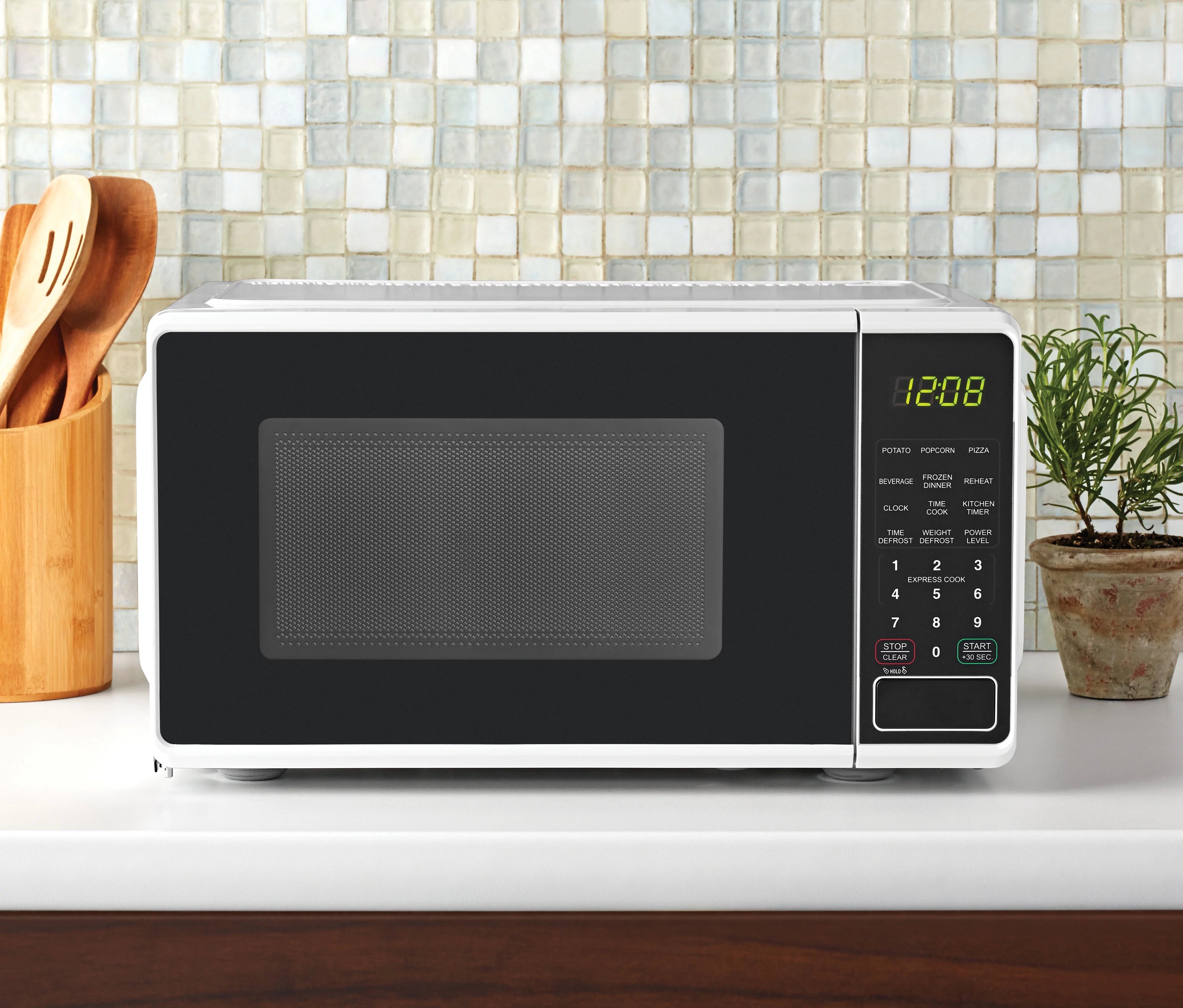 Mainstays 0.7 Cu Ft Countertop Microwave Oven, 700W, White D202